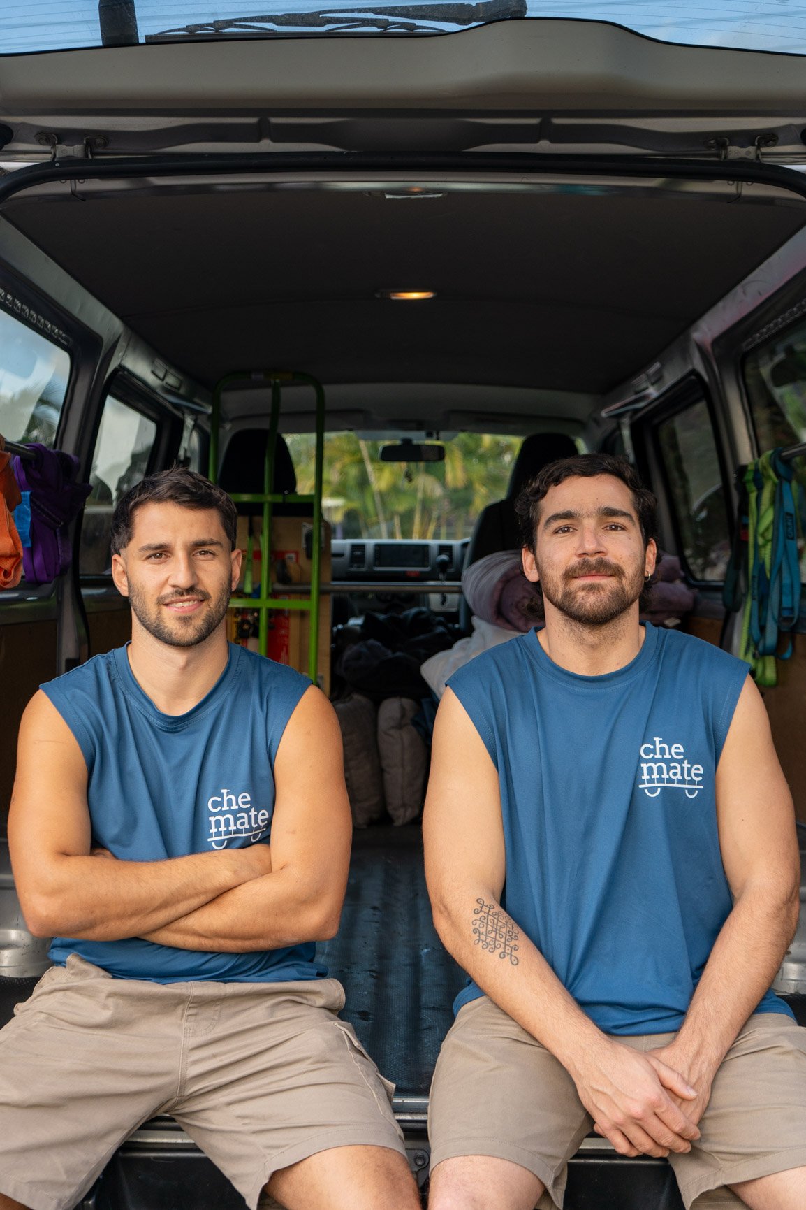 The two Che Mate owners sitting in the back of the van